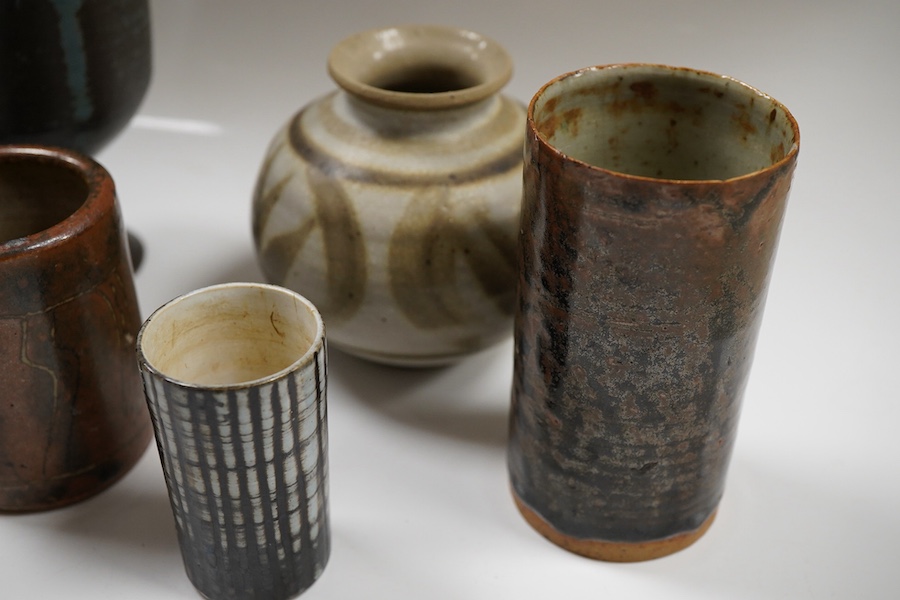 Assorted studio pottery comprising six vases and a goblet, largest 15cm high